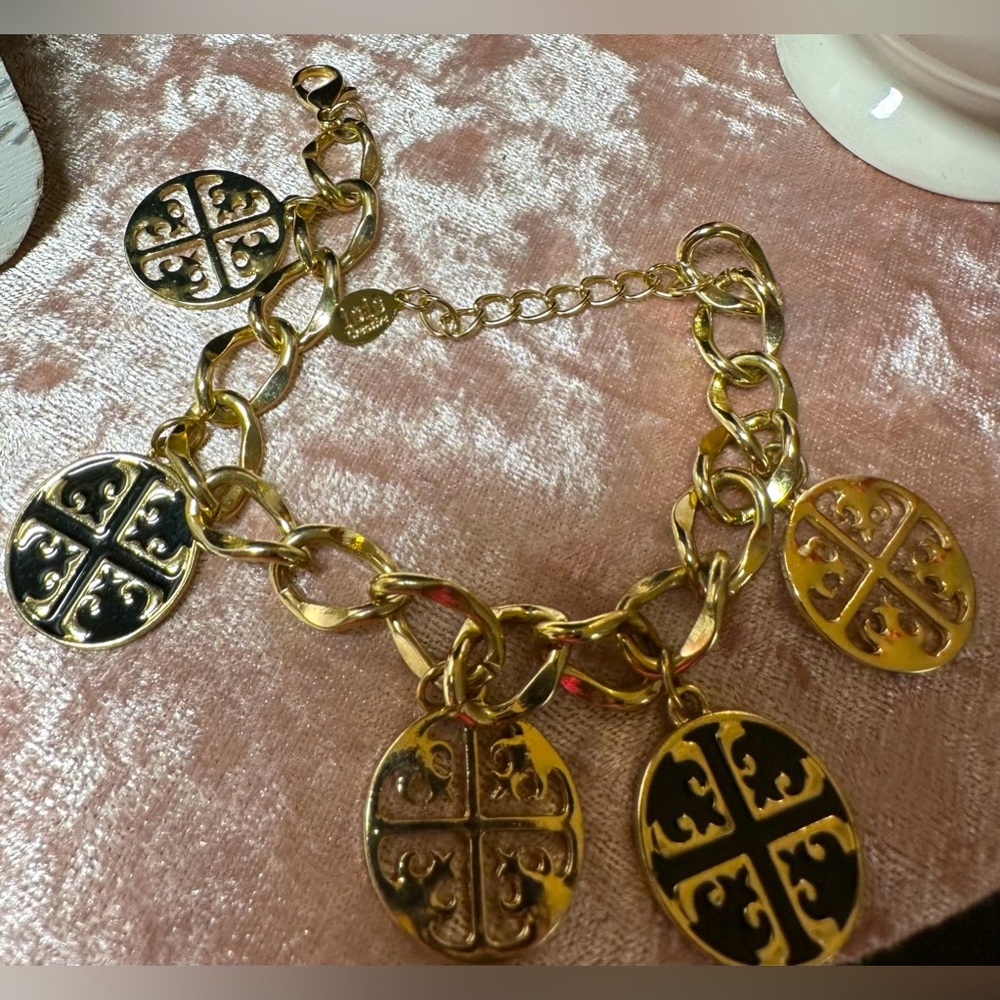 Gold toned bracelet.